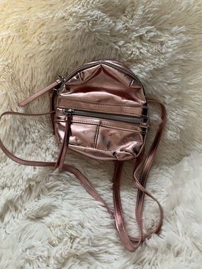 Iridescent pink mini backpack purse